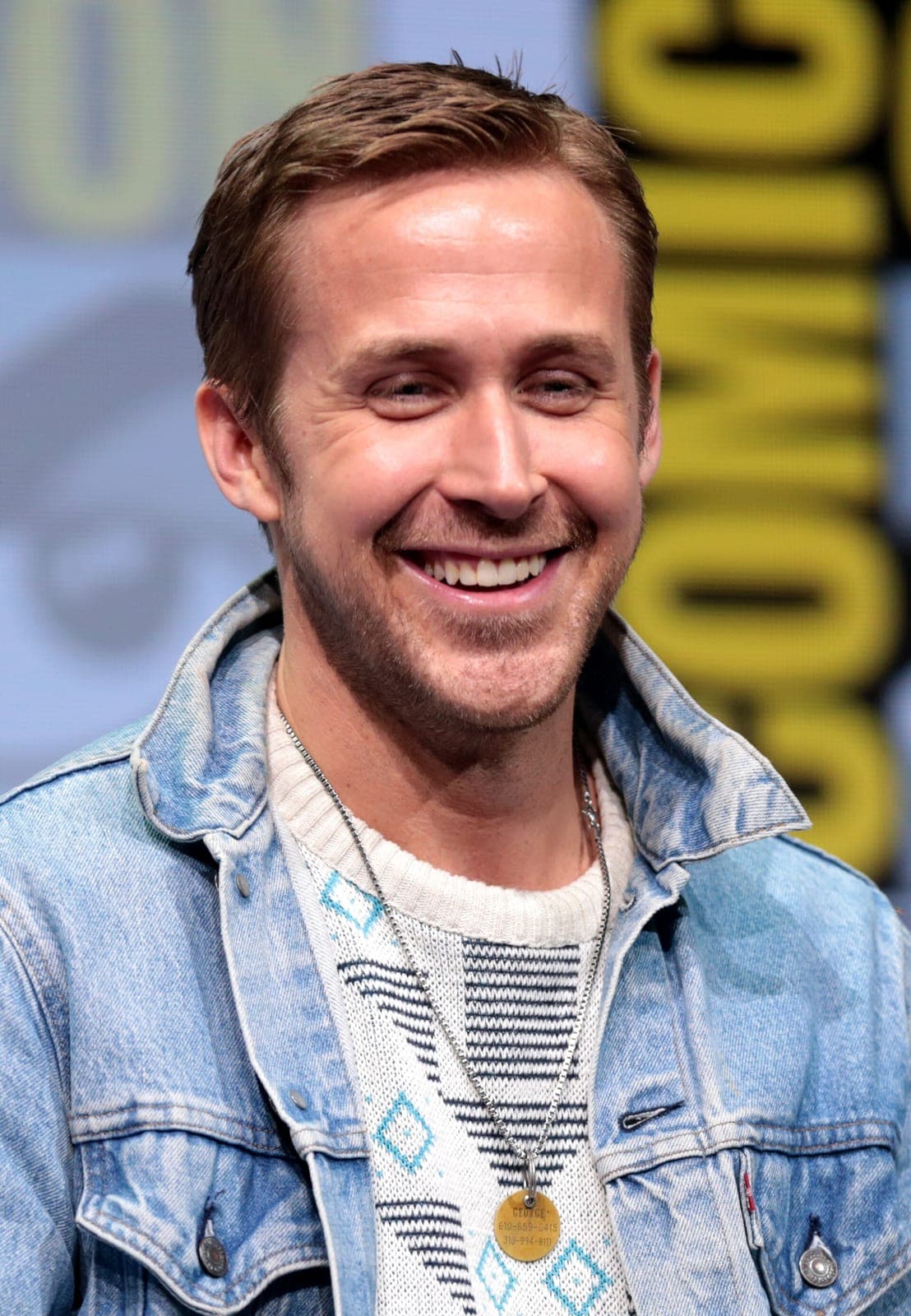 SDCC frontal — study mandibular silhouette when soft-smile eras meet convention flash.